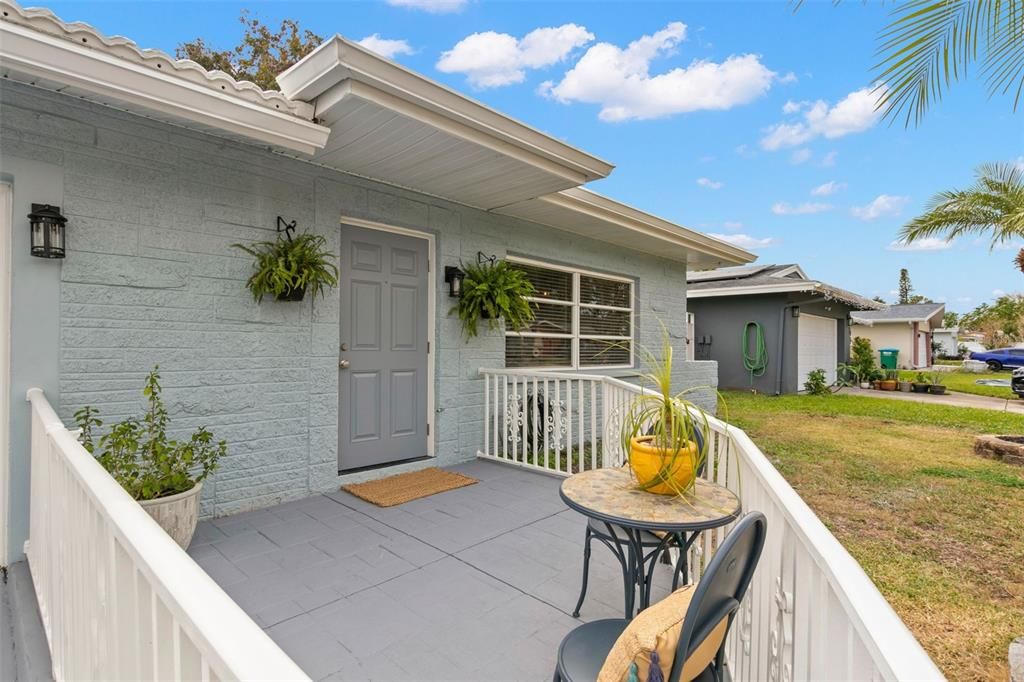 gated wing porch/exterior entrance to bedroom 3/office