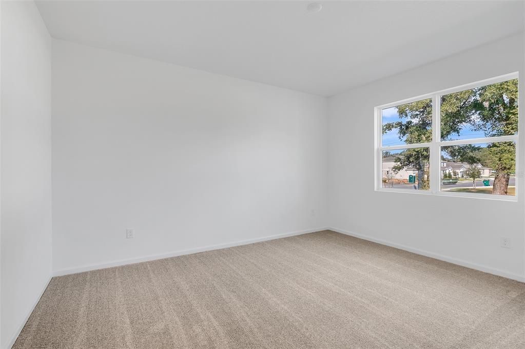 Owners Bedroom with backyard view