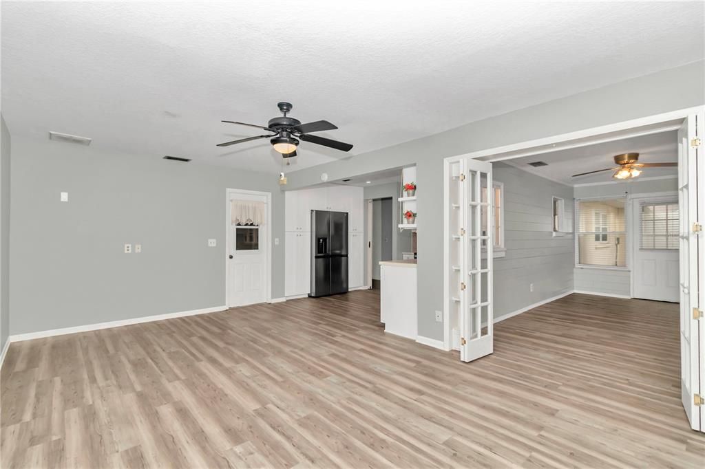 From the oversized dining room looking into the kitchen and bonus room