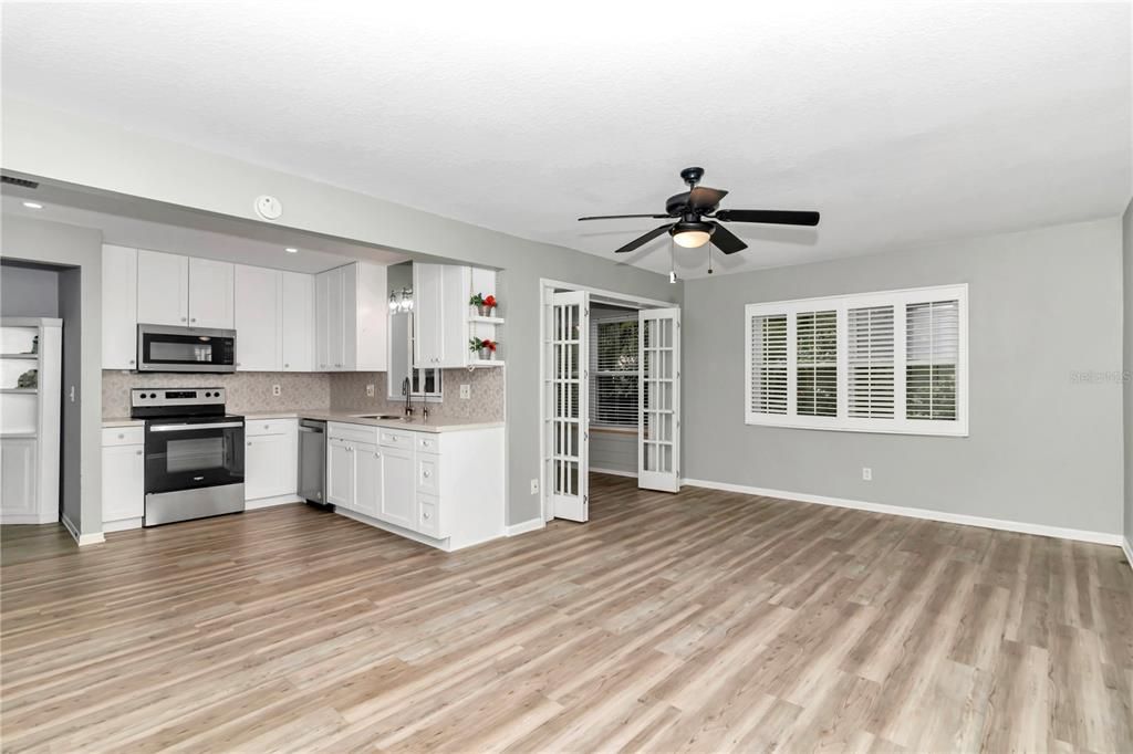 From the oversized dinning room into the kitchen and bonus room