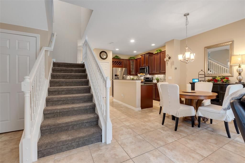 Staircase leads to bedrooms/baths/laundry