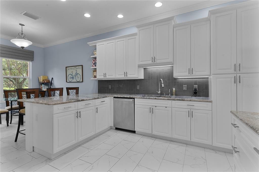 FULLY EQUIPPED KITCHEN, GRANOITE COUNTERS, , AMPLE CABINETS, GAS RANGE, PORCELAIN TILED FLOORS