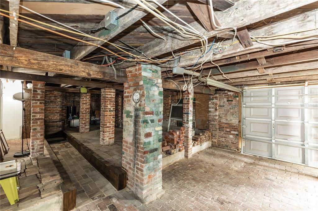 Unfinished Basement with Rolling Door