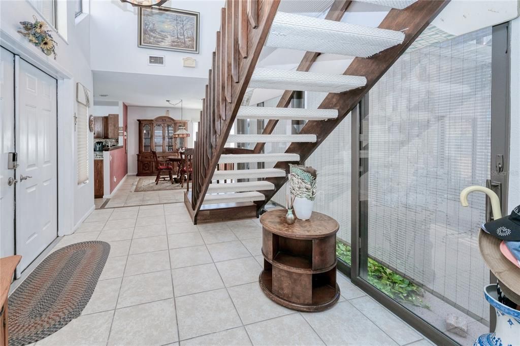 Entrance of Home with staircase to bonus rooms