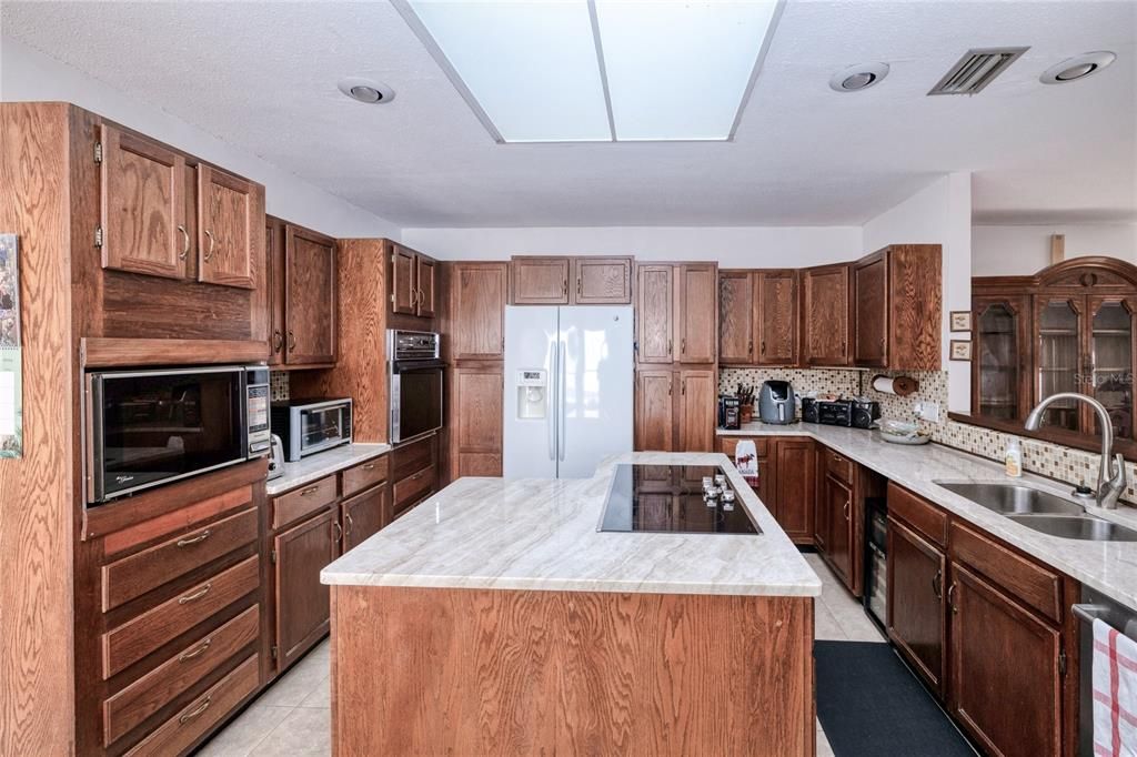 Large wood cabinetry for kitchen storage