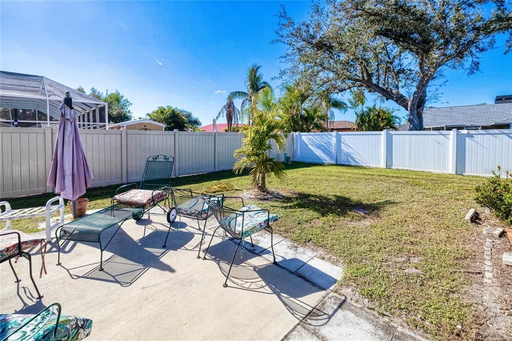 Patio area in fully fenced back yard