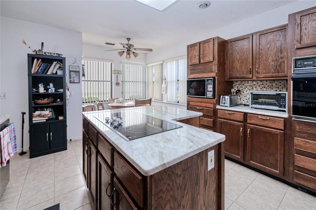 Additional view of large kitchen space with beautiful solid wood cabinets