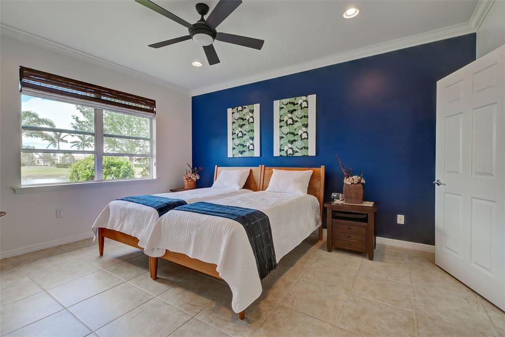 Primary bedroom with ceiling fan