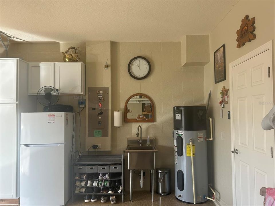 Stainless Steel Sink and 50 Gallon Hot Water Tank