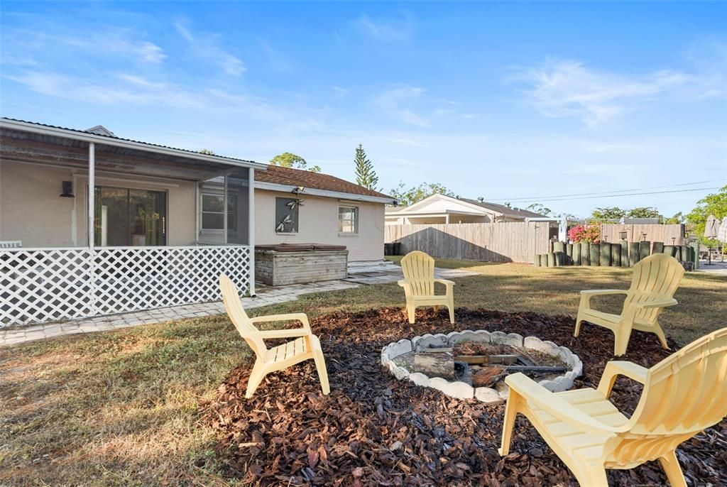 Large backyard and firepit area