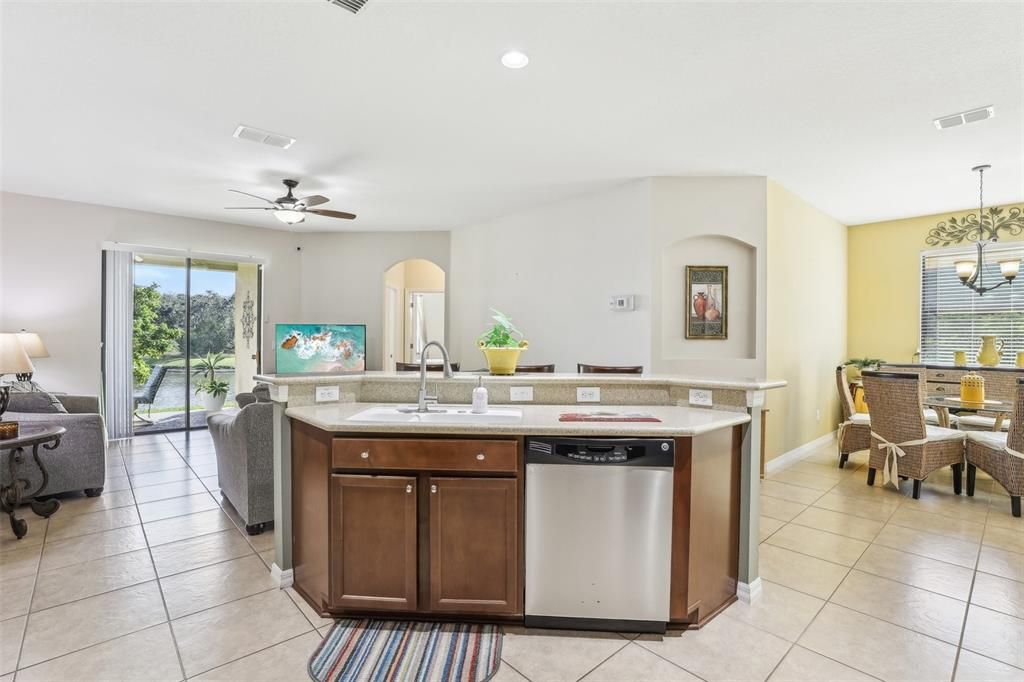 The Kitchen Overlooks the Family Room and the Pond and Conservation!