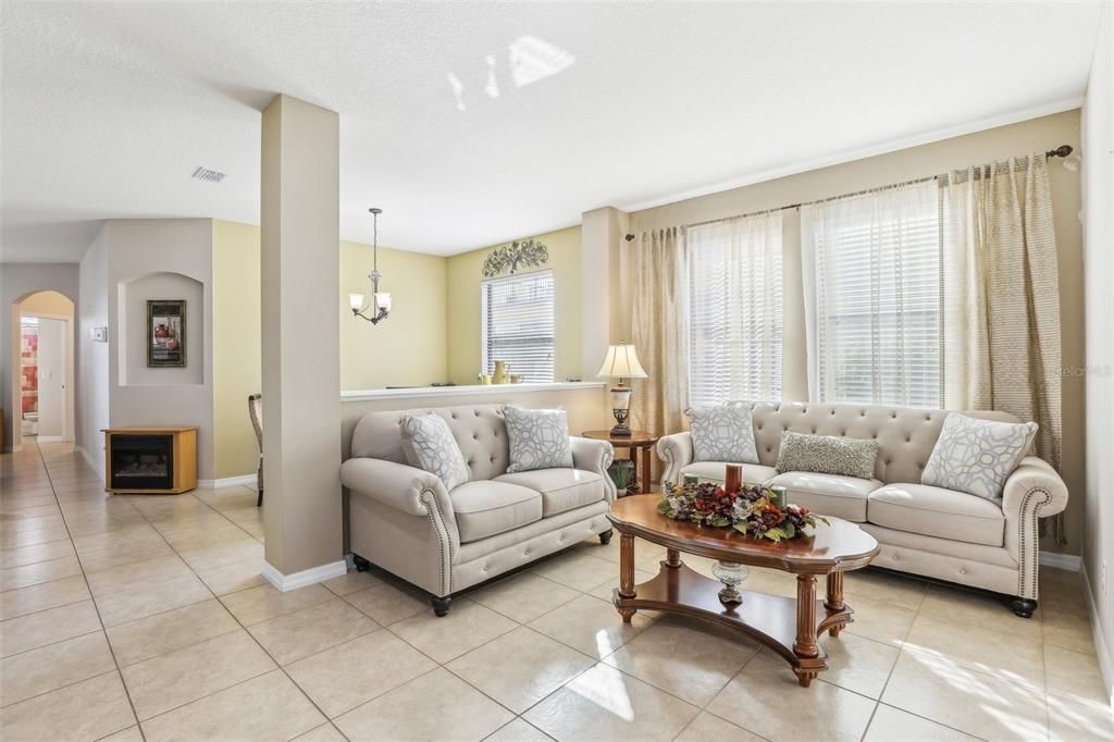 Once Inside, you are met with a High Ceilings, an Extremely Desirable 3-Way- Split Open Floor Plan that INCLUDES 2 PRIMARY SUITES!! This Floor Plan is PERFECT for MULTI-GENERATIONAL Living or if you have that Family Member that also likes their own privacy within the house