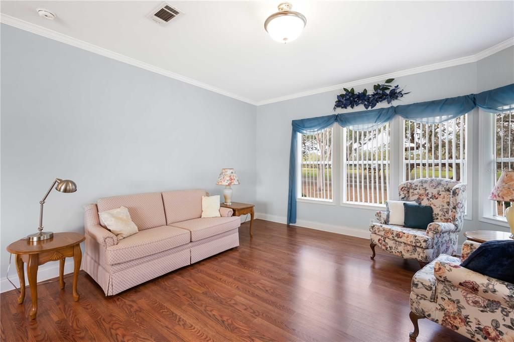 Living room windows look out to center of the community.