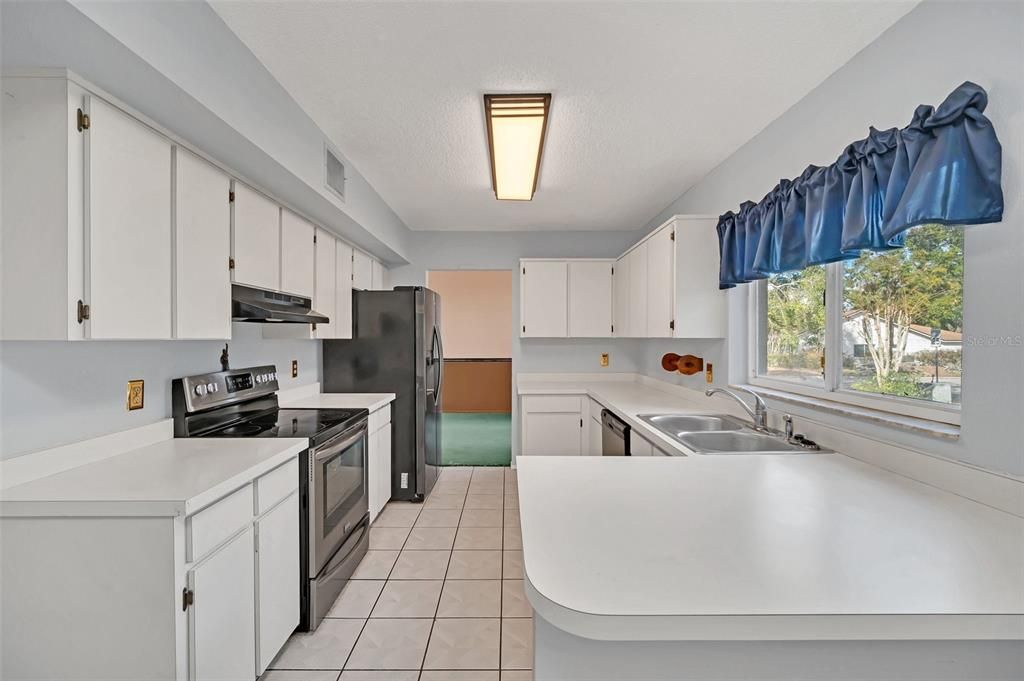 Kitchen with Eating Space and backyard views!