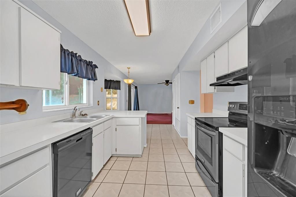 Kitchen with Eating Space and backyard views!