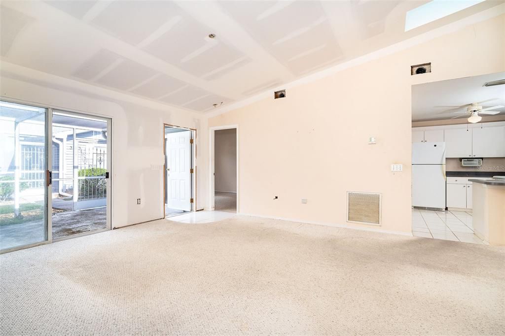 Open floor plan with high ceilings