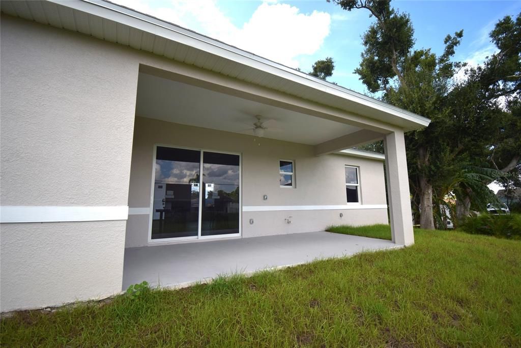 Back of house, covered patio.