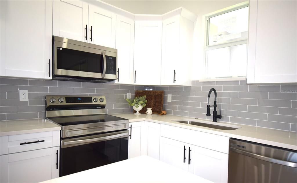 Kitchen, stainless steel appliances.