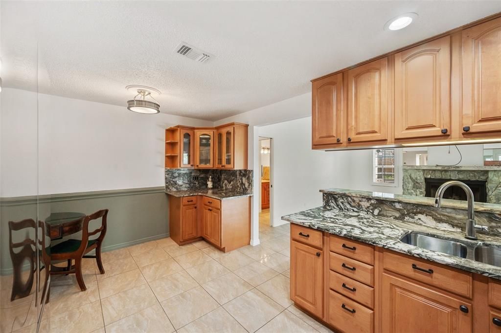 Kitchen. Doorway in center leads to 2 additional bedrooms and guest bath that exits to pool.