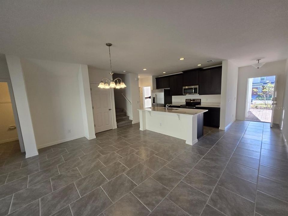 Living+dining. Garage door to house and main house door.