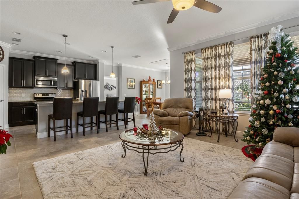 Living room looking into kitchen/ dining room