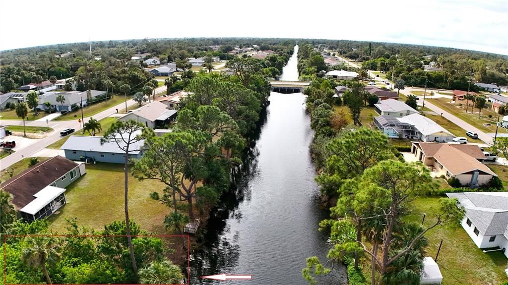 Lot on the left. Looking down the canal towards Quesada Ave.