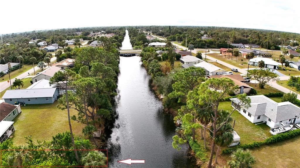 Looking south, the lot is on the left (see arrow).