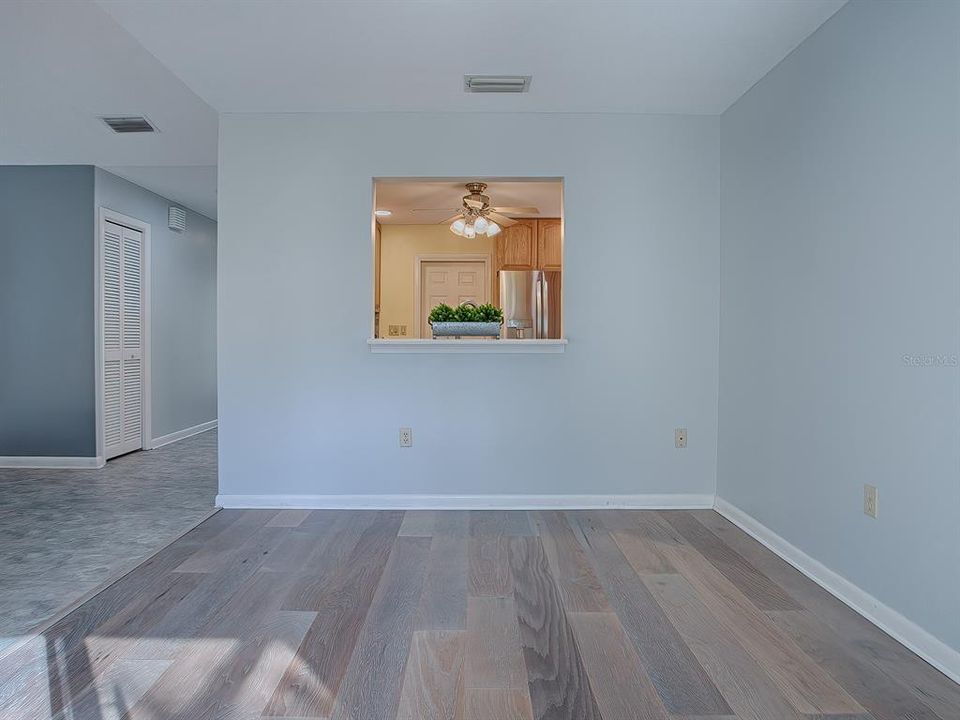 Dining room showing smart pass through to kitchen