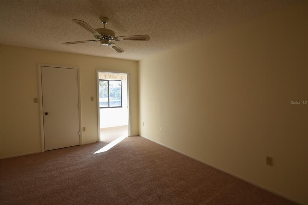 Master bedroom with view of water