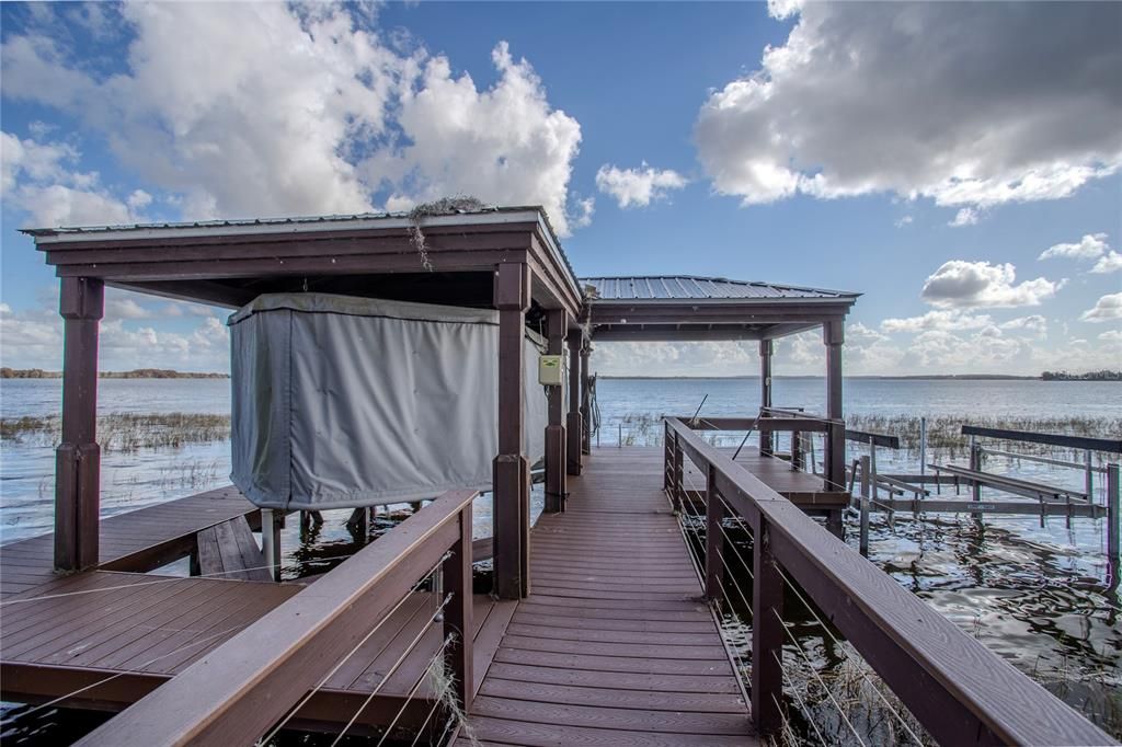 Boathouse with Touchless Cover. Great Decking and Additional Boat Lift