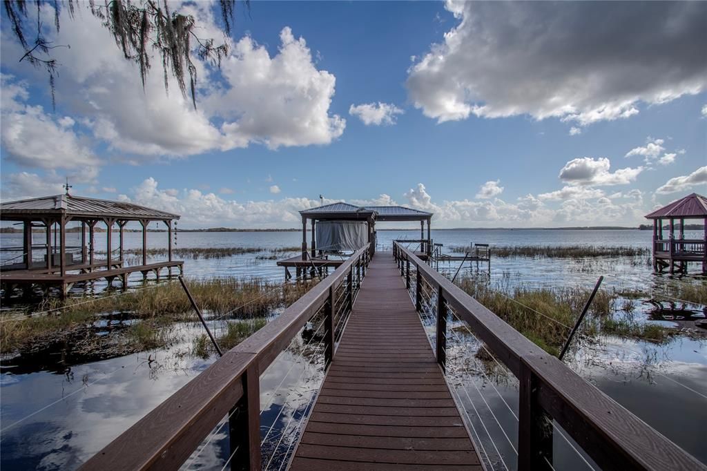 Dock with hand rails and safety wires.