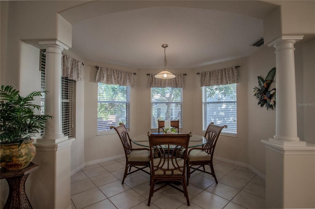 Pleasant Morning Room/Dinette space surrounded by windows