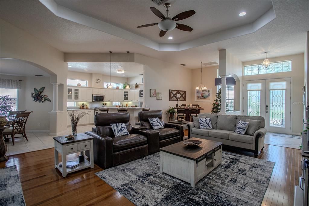 Magnificent high tray ceilings, rich wood floors, open and practical elegance.