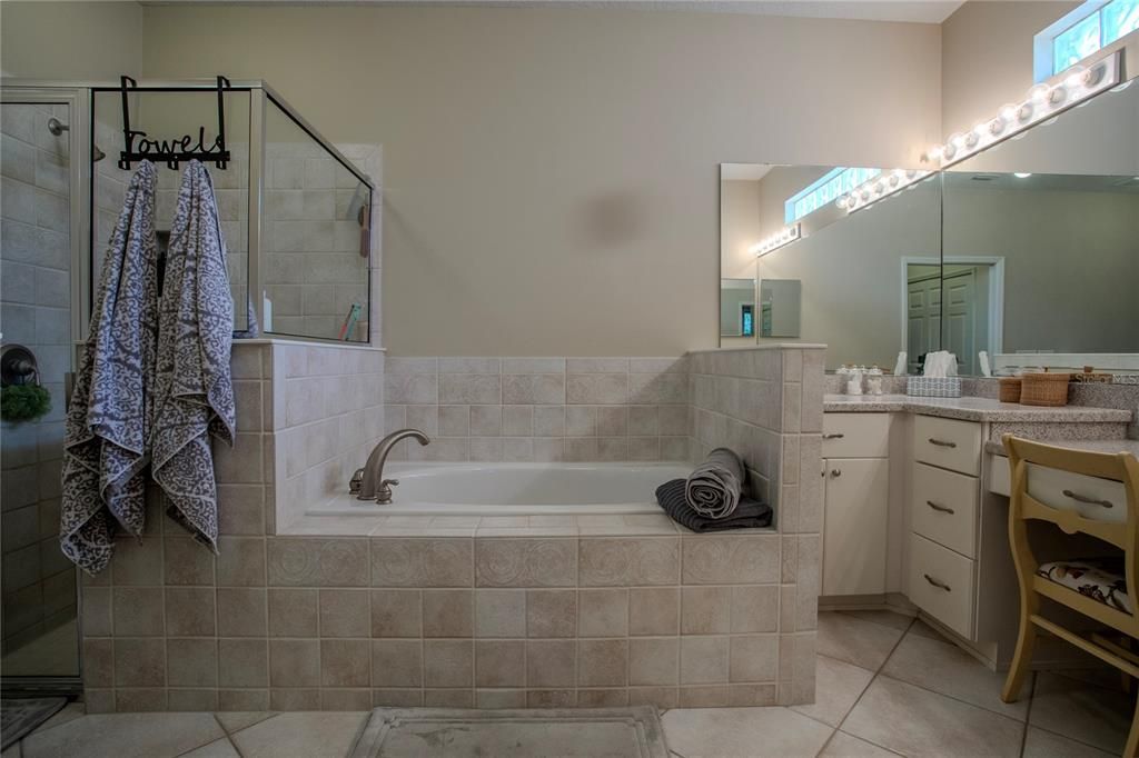 Primary Bath with large walk-in shower and wonderful jetted tub.