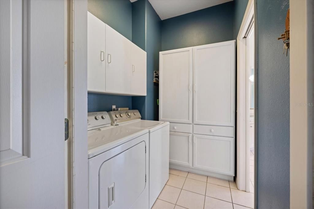 Laundry room with pantry