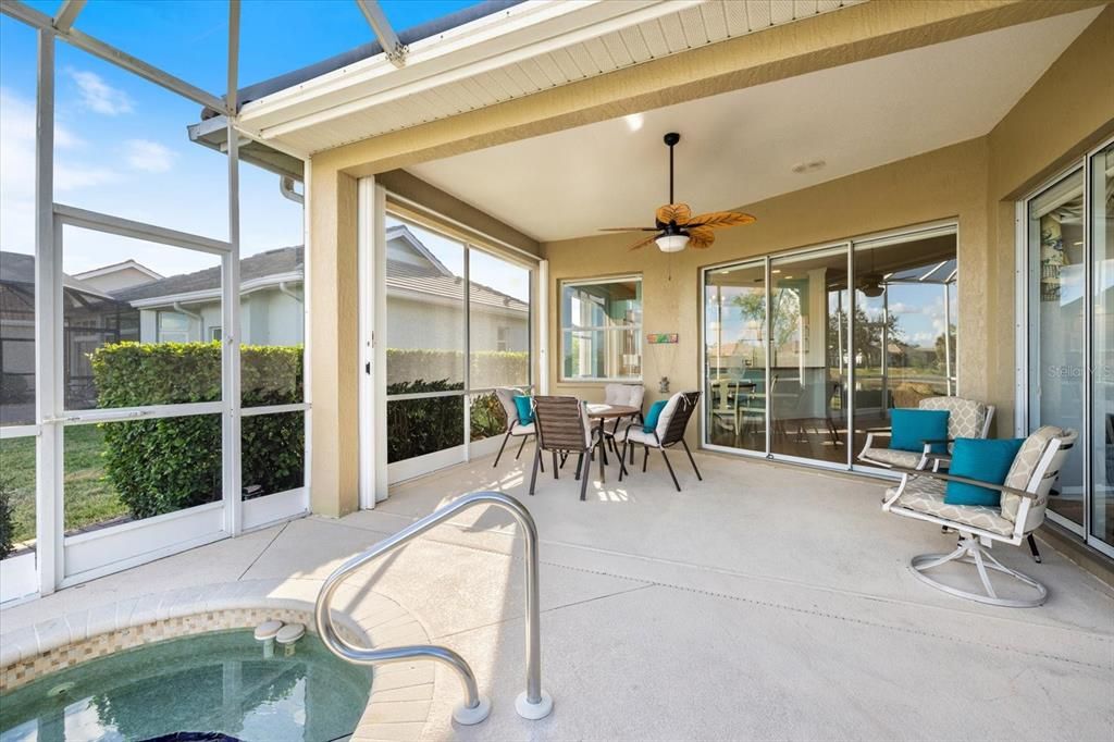 Large covered lanai with heated spa