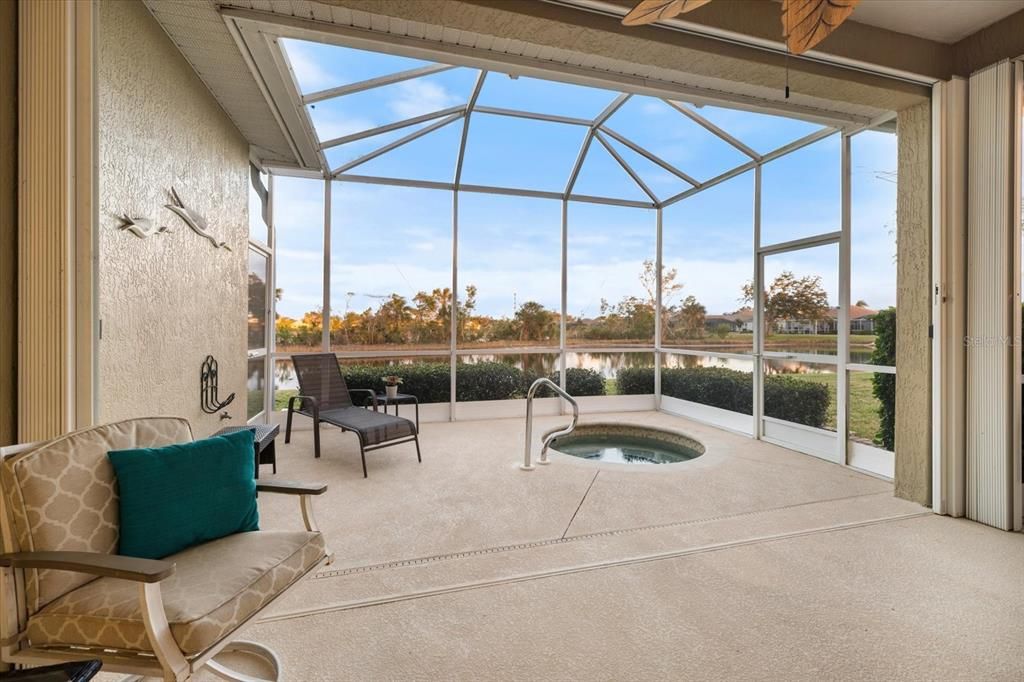 Large covered lanai with heated spa