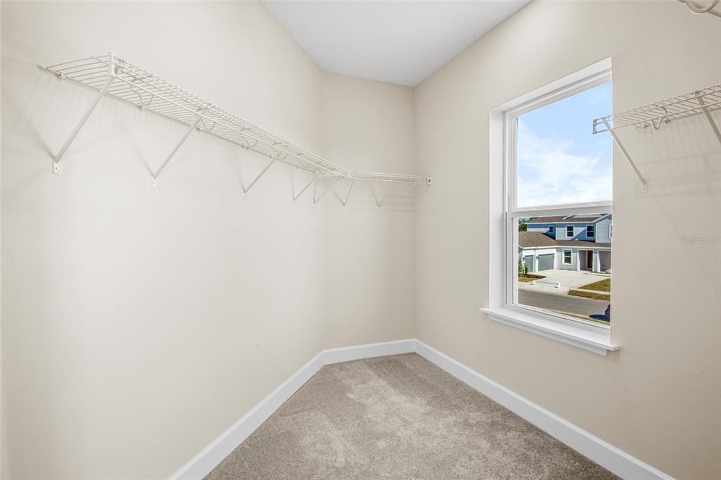 Upstairs bedroom walk-in closet