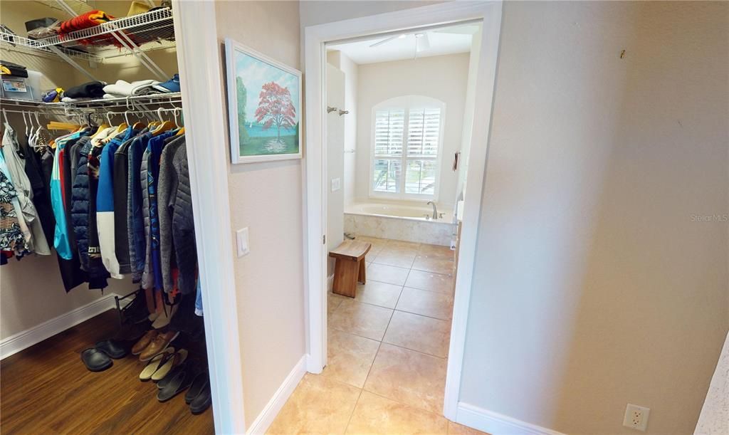 Primary bedroom closet and bath