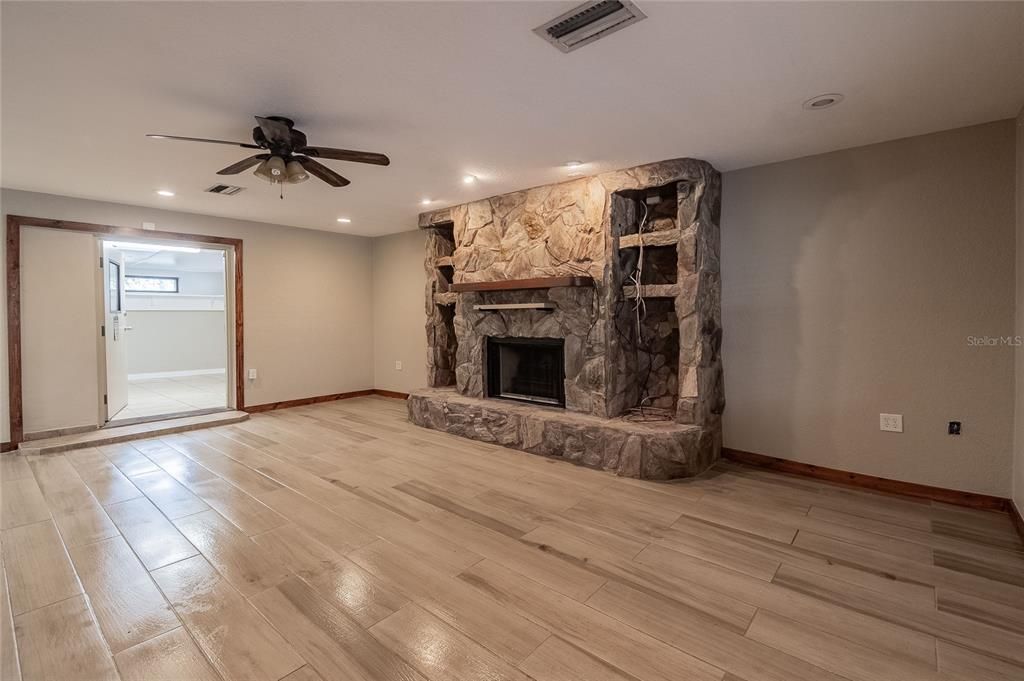 Family Room with wood-burning fireplace