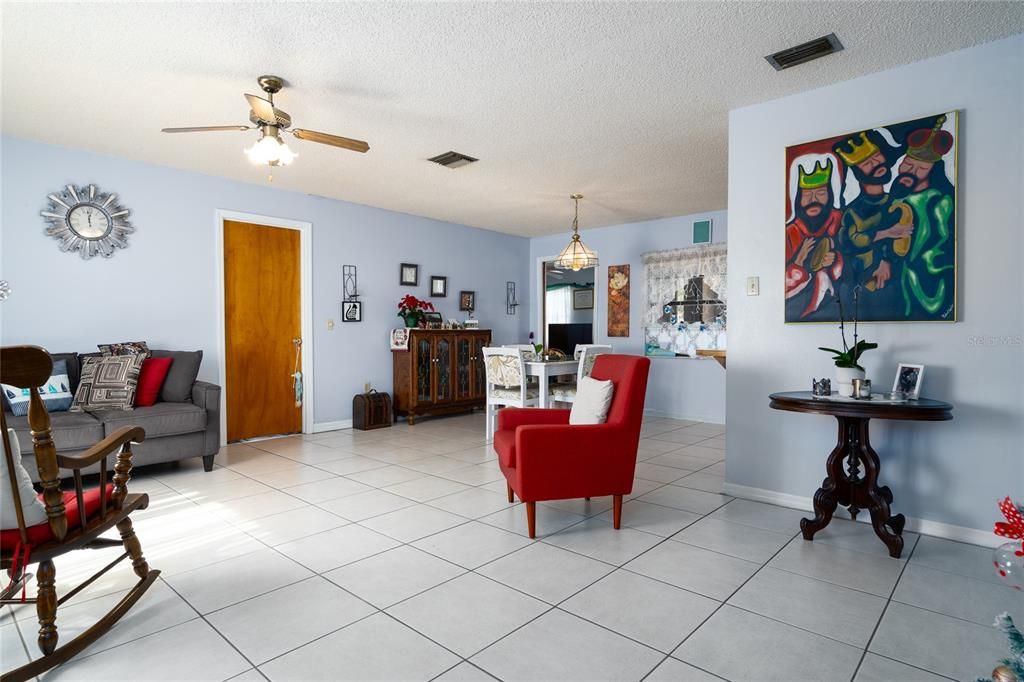 Front living room and dining area (afar) from entrance.