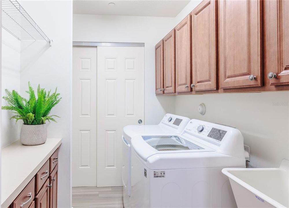 Laundry room with sink