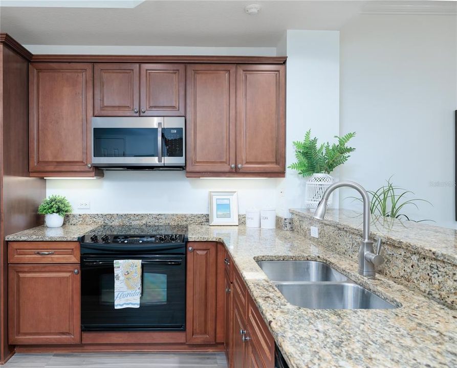 Stone counters, plenty of cabinets