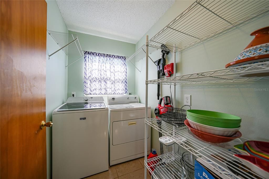 Laundry room and additional storage/pantry