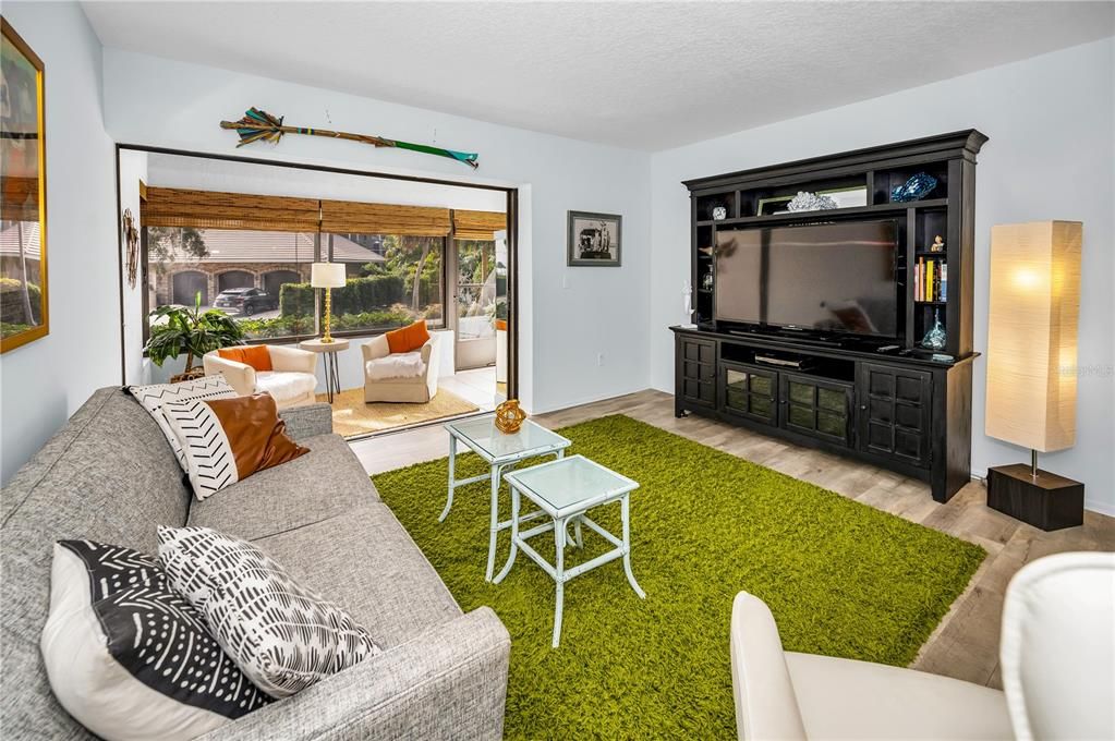 Living Room Opens to sunroom with Waterviews!