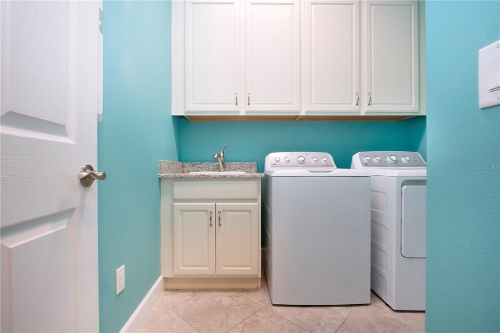 Inside Laundry Room w/Washer, Dryer, Utility Tub & Add'l storage cabinets