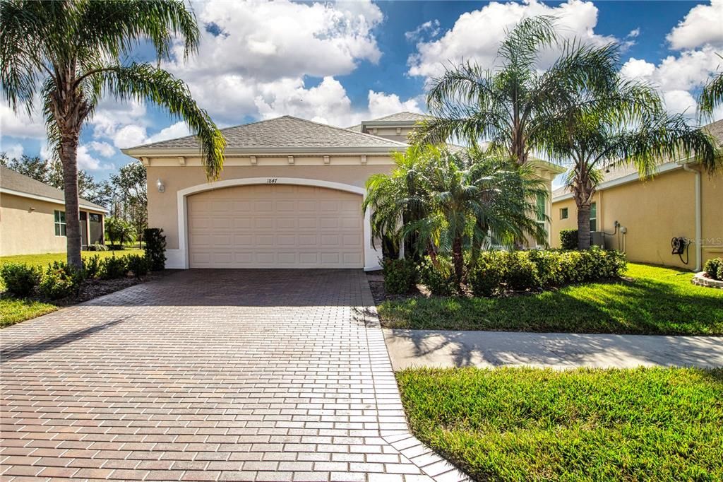 Front of home-Paver driveway & sidewalk