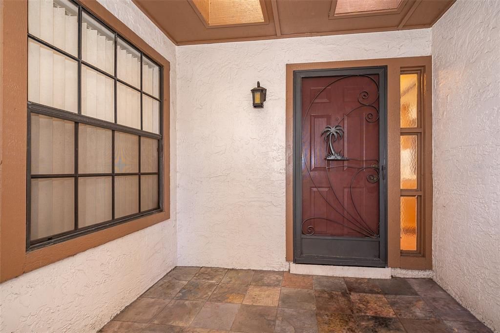 Courtyard between the front door and garage