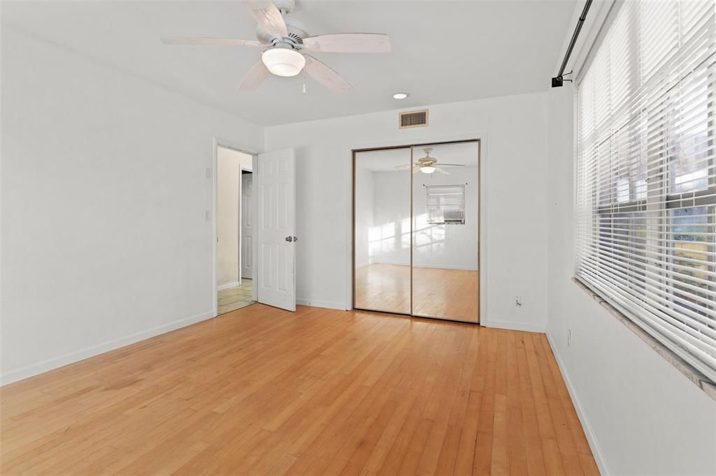 Bedroom 1 with wood floors