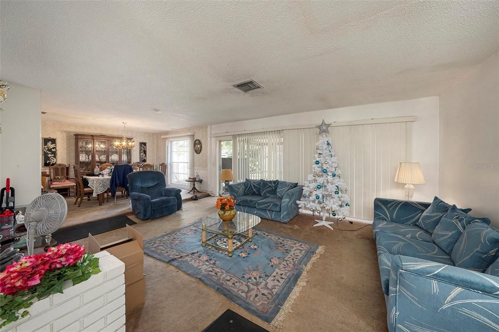 Open floor plan from living to dining room.